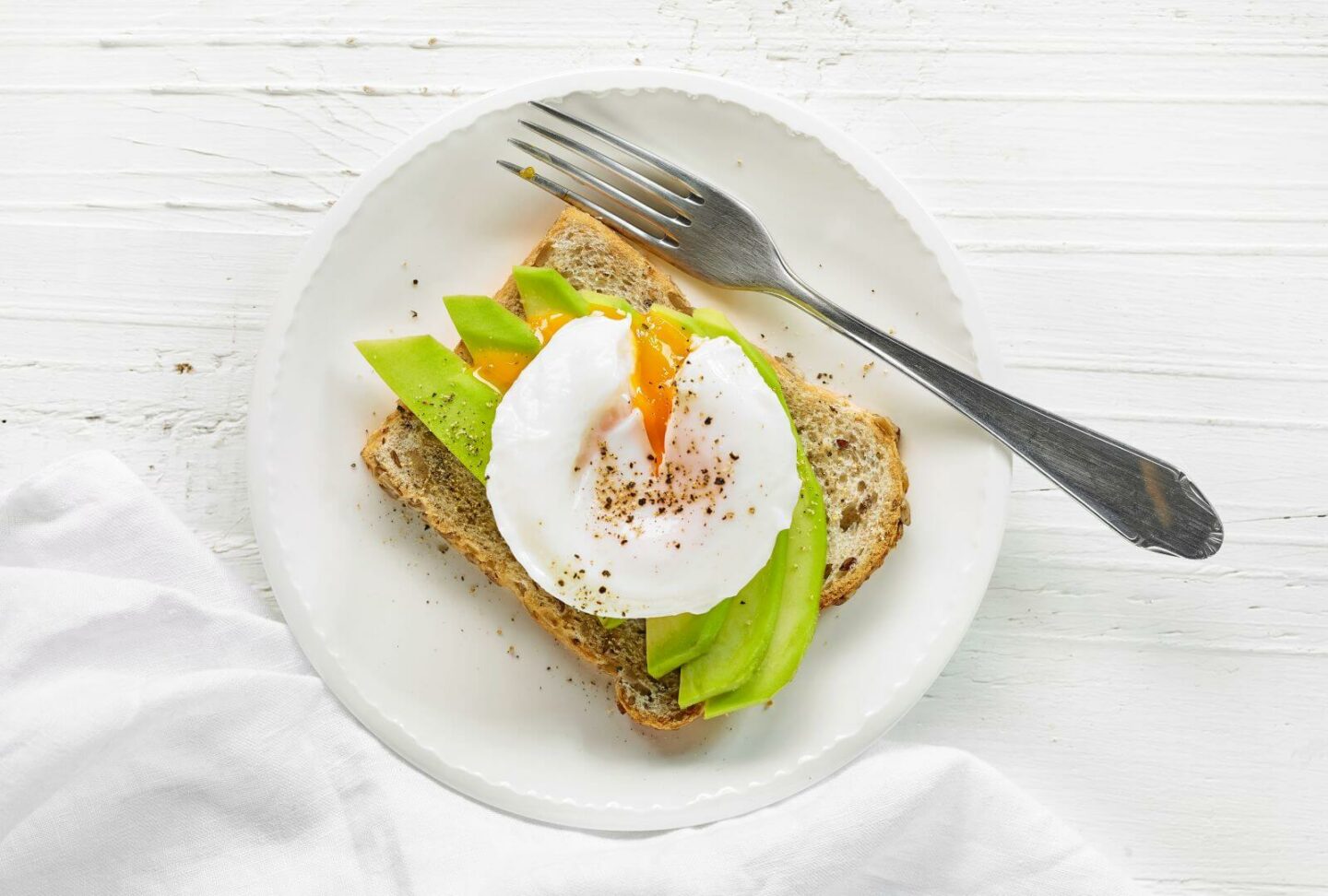 sandwich with avocado and poached egg