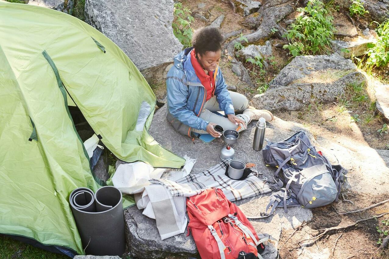 woman drinking tea during camping 2025 02 11 15 38 38 utc